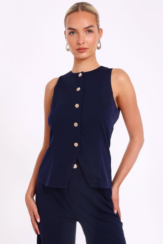 - Woven finish - Round neckline - Button front - Model height: 5'7" - Model wears uk 8 / us 4 / eur 36 - Always check the wash care label - Cool hand wash with mild detergent