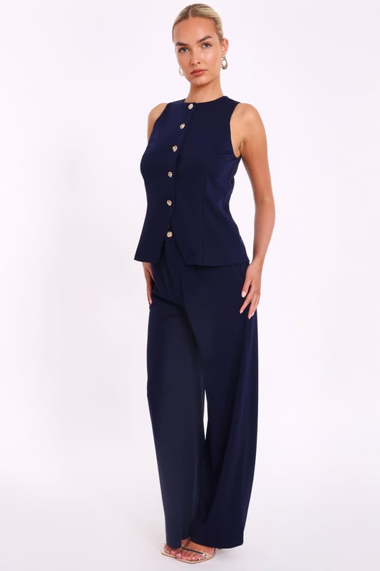 - Woven finish - Round neckline - Button front - Model height: 5'7" - Model wears uk 8 / us 4 / eur 36 - Always check the wash care label - Cool hand wash with mild detergent