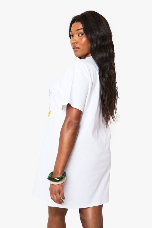 Oversized T-shirt dress featuring a vibrant Saint Tropez strawberry graphic print
        Relaxed crew neckline and short sleeves for effortless comfort
        Cotton fabric offers breathable wear perfect for warmer days
        Versatile mini length ideal for casual styling
        Plus size design with a roomy, comfortable fit
    
    This playful Saint Tropez graphic T-shirt dress from Boohoo brings carefree holiday vibes to your everyday wardrobe. The oversized silhouette creates a relaxed look that's both comfortable and on-trend. Style it as seen with ankle boots and a woven tote for farmers' markets and weekend brunches, or pair with trainers and a denim jacket for casual coffee dates. For festival season, add chunky jewellery and wellies for an effortlessly cool ensemble. The versatile design works brilliantly with leggings underneath during transitional weather, while the cotton composition ensures all-day comfort. This T-shirt dress embodies the laid-back aesthetic that's perfect for casual gatherings and daytime outings when you want to combine comfort with personality.