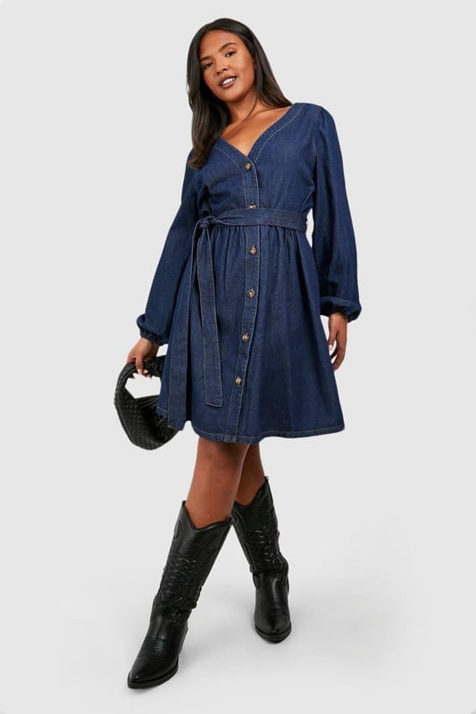 Bring a new kinda attitude in this latest piece from our collection of plus size dresses. Available in UK sizes 16-24, our range of curve dresses carries all the on-trend pieces you need to feel confident. Whether it's a plus size black dress or skater style you're adding to your basket, we promise no more awkward fits, just dresses you can depend on. Work a flattering plus size t-shirt dress or smock shapes during the day, then take on the night in sexy styles, maxi lengths and Bardot necklines. From sexy plus size dresses to work-wear appropriate options, shop it all on boohoo.Style: Denim DressFabric: DenimLength: MiniSleeve Length: Long Sleeve
