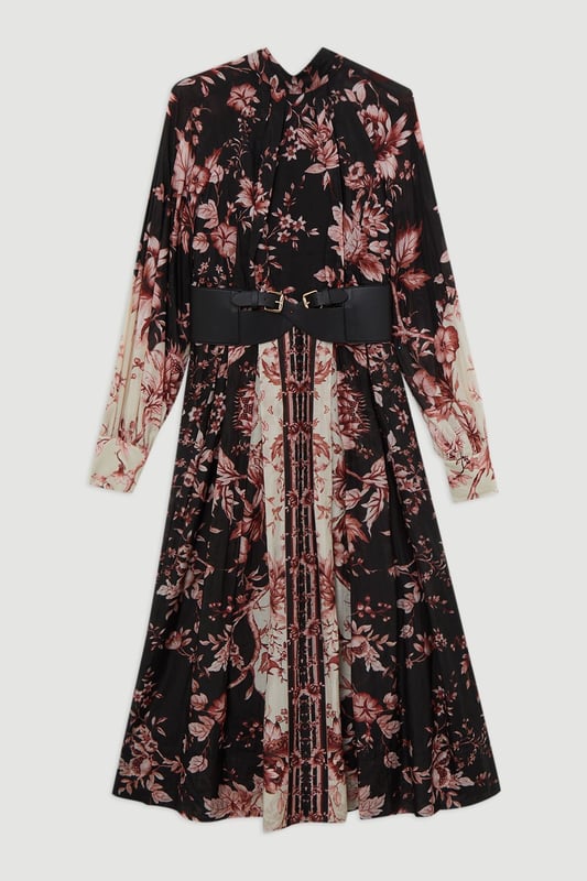 Silk Cotton Border Print Floral Woven Maxi Dress Step out in confidence in our long sleeve dress, which is made with slinky silk, and features a relaxed fit and long, balloon style sleeves. The bold, floral print adds a feminine touch ideal for any occasion, and the bow behind the neck elevates it even further. This dress can easily be paired with boots or heels for a day to night look. Silk Cotton Border Print Floral Woven Maxi Dress High Quality, Smooth Silk Fabric Comfortable, Relaxed Silhouette High Neckline Vibrant Floral Print Long Balloon Sleeves Bow Accent in Back