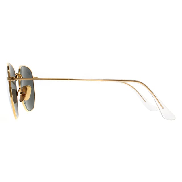Ray-Ban Square Unisex Polished Gold Green G-15 Polarized Hexagonal Titanium RB8148  Sunglasses offer a bold, modern twist on the classic geometric shape, combining sharp, hexagonal lenses with a lightweight titanium frame for a sleek, durable design. Known for their strength and corrosion resistance, the titanium frame ensures a comfortable fit without sacrificing style. The sunglasses provide excellent UV protection, while the unique shape adds a distinct edge to any look. With a minimalist yet sophisticated aesthetic, the RB8148 sunglasses are perfect for those seeking a refined, fashion-forward accessory that stands out in both urban and outdoor settings.