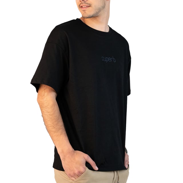 A statement-making staple. This Superb T-shirt combines minimalist style with a streetwear touch thanks to its loose fit and clean design. Perfect for relaxed looks that stand out.\\n\\n Details:\\n - Extra oversized cut, with dropped shoulders for a casual and modern fit.\\n - Wide double stitch on cuffs and hem.\\n - Tone-on-tone embroidered Superb logo on the chest adds a subtle touch of branding.\\n - Reinforced round neck, comfortable and durable.\\n - Soft and durable fabric, ideal for everyday use.\\n\\n A versatile oversized tee with attitude for those looking for effortless style. Ideal for urban or casual outfits with a distinctive touch.\\n Composition: 97% Cotton, 3% Elastane\\n Care:\\nMachine wash at maximum 30°C.\\n Do not use bleach.\\n Iron at low temperature.\\n Do not tumble dry.\\n Wash and iron inside out to preserve the embroidery.