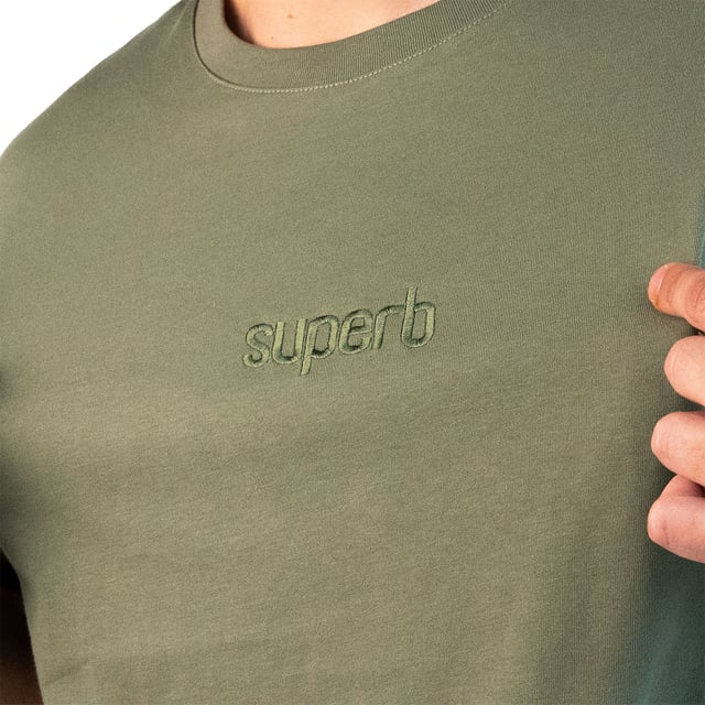 A statement-making staple. This Superb T-shirt combines minimalist style with a streetwear touch thanks to its loose fit and clean design. Perfect for relaxed looks that stand out.\\n\\n Details:\\n - Extra oversized cut, with dropped shoulders for a casual and modern fit.\\n - Wide double stitch on cuffs and hem.\\n - Tone-on-tone embroidered Superb logo on the chest adds a subtle touch of branding.\\n - Reinforced round neck, comfortable and durable.\\n - Soft and durable fabric, ideal for everyday use.\\n\\n A versatile oversized tee with attitude for those looking for effortless style. Ideal for urban or casual outfits with a distinctive touch.\\n Composition: 97% Cotton, 3% Elastane\\n Care:\\nMachine wash at maximum 30°C.\\n Do not use bleach.\\n Iron at low temperature.\\n Do not tumble dry.\\n Wash and iron inside out to preserve the embroidery.