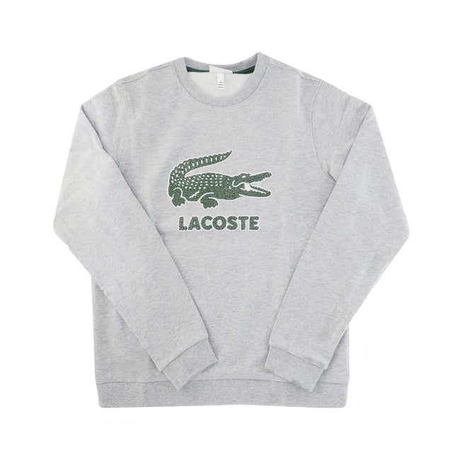 Boys’ Crew Neck Vintage Logo Fleece Sweatshirt Unbrushed cotton blend fleece Ribbed crew neck Tone-on-tone ribbed finishes at sleeve ends and bottom of garment Print Lacoste lettering and crocodile on chest Embroidered green crocodile on back