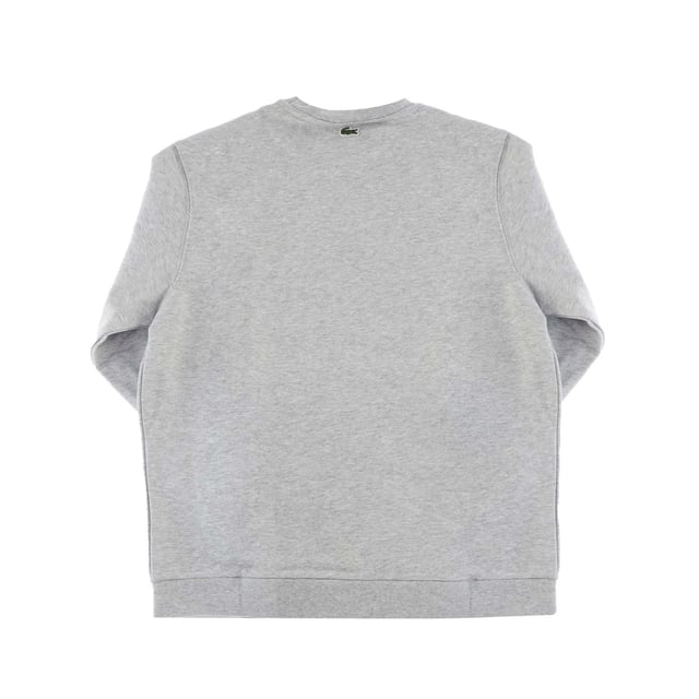 Boys’ Crew Neck Vintage Logo Fleece Sweatshirt Unbrushed cotton blend fleece Ribbed crew neck Tone-on-tone ribbed finishes at sleeve ends and bottom of garment Print Lacoste lettering and crocodile on chest Embroidered green crocodile on back