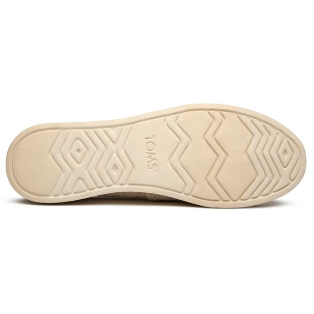Effortlessly chic and wonderfully comfortable, these canvas espadrilles bring laid-back sophistication to any wardrobe. The natural tone pairs beautifully with everything from flowing sundresses to cropped denim, while the durable rubber sole provides reliable traction for all your adventures. Classic TOMS styling meets enhanced comfort in this elevated take on the beloved Alpargata silhouette.