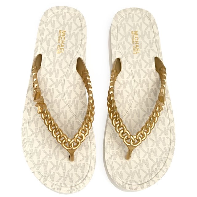 The Michael Kors Zaza brings effortless sophistication to your summer wardrobe with its sleek natural colorway and signature chain-effect straps. These versatile slides transition seamlessly from poolside lounging to casual city strolls, while the durable PVC upper and rubber sole ensure lasting comfort. The understated MK branding adds that perfect touch of luxury to your everyday essentials.