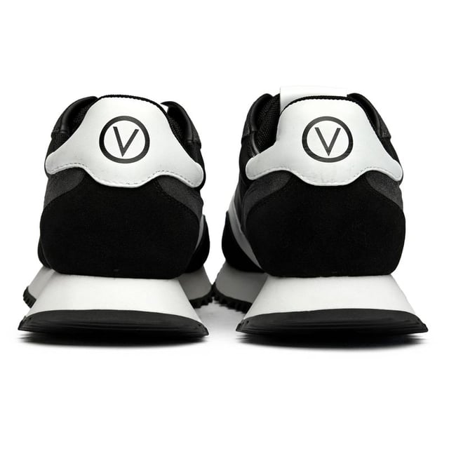 The Valentino Dred elevates athletic-inspired style with luxurious Italian craftsmanship. These sleek black trainers feature premium suede uppers paired with a responsive EVA sole for all-day comfort. Signature Valentino branding adds an unmistakable designer edge to the running-inspired silhouette. Complete with a branded shoe bag, they're the perfect fusion of high fashion and street-ready functionality.