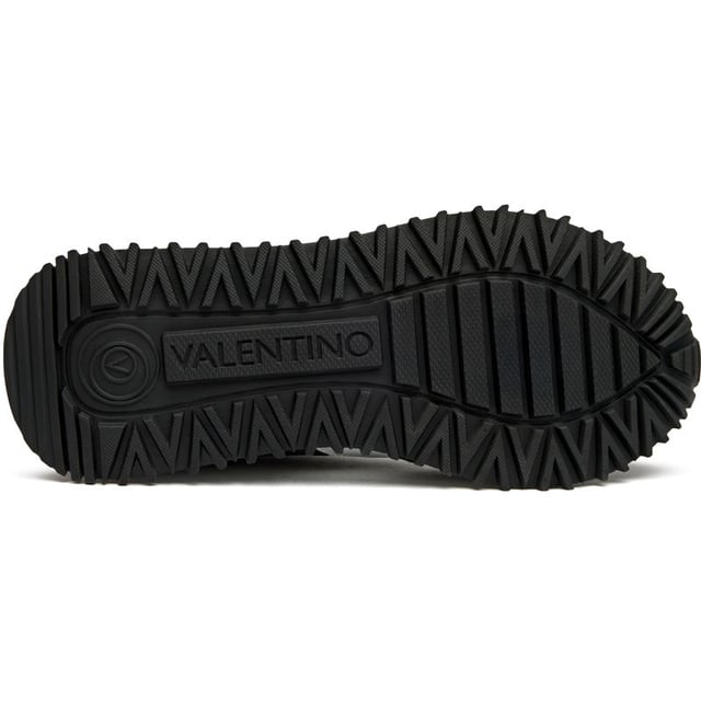 The Valentino Dred elevates athletic-inspired style with luxurious Italian craftsmanship. These sleek black trainers feature premium suede uppers paired with a responsive EVA sole for all-day comfort. Signature Valentino branding adds an unmistakable designer edge to the running-inspired silhouette. Complete with a branded shoe bag, they're the perfect fusion of high fashion and street-ready functionality.