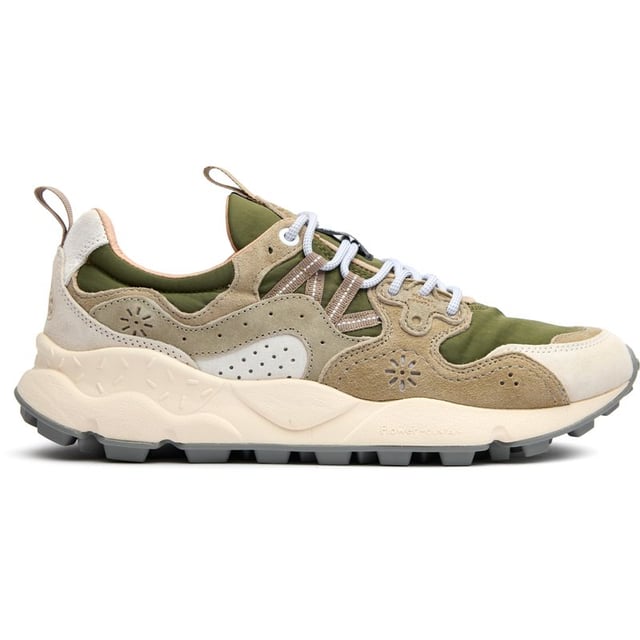 Discover the Flower Mountain Yamano 3, a distinctive running-inspired trainer that blends functionality with natural elements. The lush green colorway showcases premium suede and nylon construction, while leather lining offers superior comfort against your feet. Natural cork antibacterial insoles provide a fresh feel all day long. Thoughtful details like nylon pull tabs and the signature branded leather patch elevate these lightweight trainers, supported by a responsive EVA midsole and durable rubber outsole.