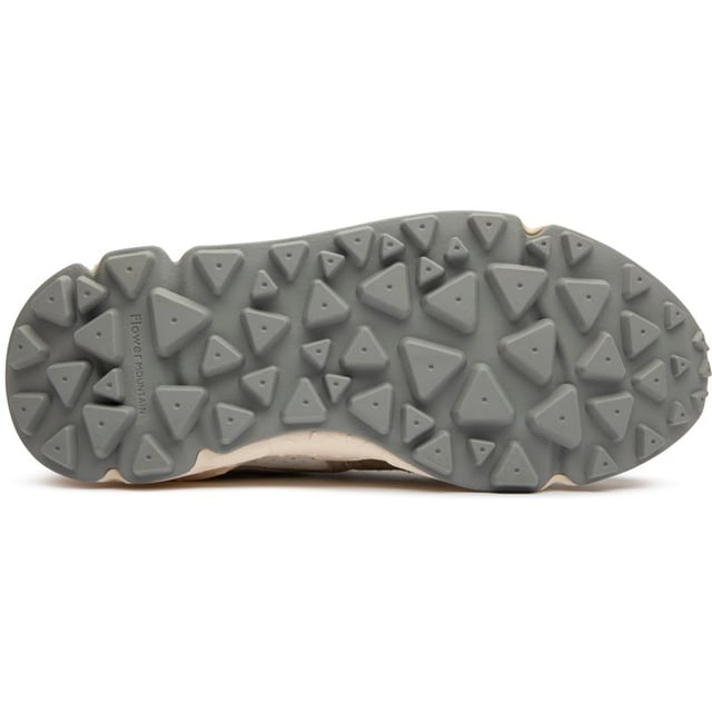 Discover the Flower Mountain Yamano 3, a distinctive running-inspired trainer that blends functionality with natural elements. The lush green colorway showcases premium suede and nylon construction, while leather lining offers superior comfort against your feet. Natural cork antibacterial insoles provide a fresh feel all day long. Thoughtful details like nylon pull tabs and the signature branded leather patch elevate these lightweight trainers, supported by a responsive EVA midsole and durable rubber outsole.