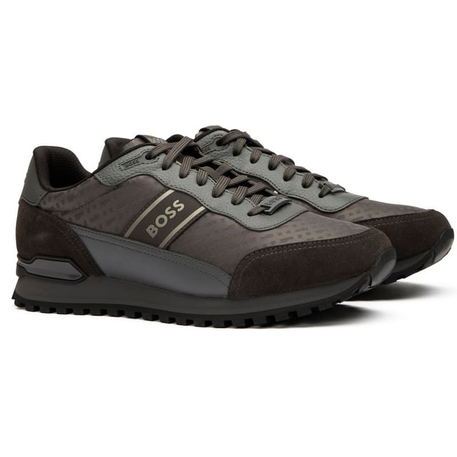 Boss Parkour Trainers The Boss Parkour combines urban style with running-inspired design in a sleek dark grey and black silhouette. Crafted with premium nylon uppers offering a luxurious finish while maintaining breathability, these men's trainers deliver exceptional comfort for daily wear. The lightweight EVA rubber outsole provides reliable traction and long-lasting durability without weighing you down. Perfect for casual outings or active days, BOSS delivers their signature refined aesthetic in a performance-ready package.