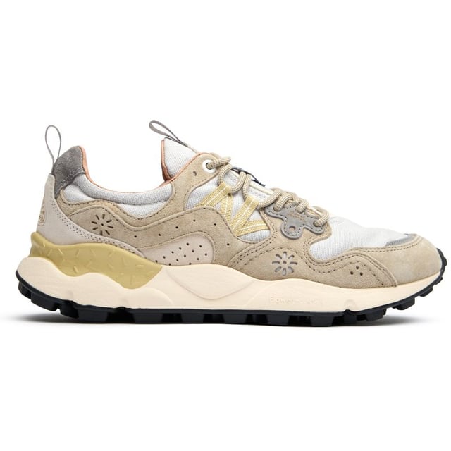 The Flower Mountain Yamano 3 Uni trainers blend outdoor inspiration with contemporary design. Crafted with premium nylon and suede uppers, these natural-toned running-style shoes deliver both durability and style. The distinctive branded leather patch adds character, while cork antibacterial insoles provide natural freshness. Practical touches include convenient pull tabs and a lightweight EVA midsole/rubber sole combination that ensures all-day comfort. Perfect for the urban explorer who values Japanese-inspired quality craftsmanship and understated aesthetics.