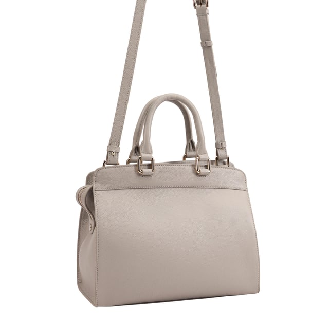 Discover the perfect blend of style and functionality with our Elegant Leather Grab Bag. Made from luxurious, soft grainy leather, this bag is designed for daily use. The spacious interior keeps your essentials organized, featuring zip and slip pockets for convenience. The secure top zip closure ensures your belongings stay safe. With its sleek design and subtle brand logo, this grab bag is ideal for any occasion. The adjustable shoulder strap offers versatile carrying options, making it a must-have accessory.