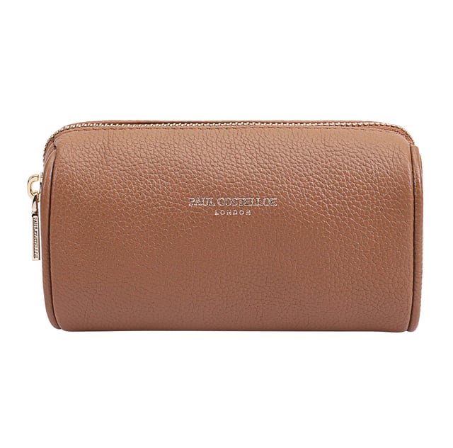 Discover the perfect blend of style and functionality with our medium-sized leather makeup and jewellery case. Crafted from high-quality soft leather, this travel-friendly organiser is designed to keep your essentials neatly arranged. Its compact yet spacious design ensures that your beauty items and accessories are always within reach, making it ideal for both personal use and as a thoughtful gift. Elevate your travel experience with this elegant and practical case that combines luxury with convenience.