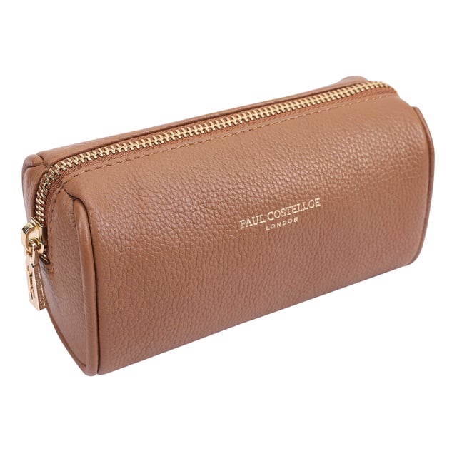 Discover the perfect blend of style and functionality with our medium-sized leather makeup and jewellery case. Crafted from high-quality soft leather, this travel-friendly organiser is designed to keep your essentials neatly arranged. Its compact yet spacious design ensures that your beauty items and accessories are always within reach, making it ideal for both personal use and as a thoughtful gift. Elevate your travel experience with this elegant and practical case that combines luxury with convenience.