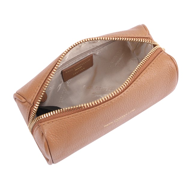 Discover the perfect blend of style and functionality with our medium-sized leather makeup and jewellery case. Crafted from high-quality soft leather, this travel-friendly organiser is designed to keep your essentials neatly arranged. Its compact yet spacious design ensures that your beauty items and accessories are always within reach, making it ideal for both personal use and as a thoughtful gift. Elevate your travel experience with this elegant and practical case that combines luxury with convenience.