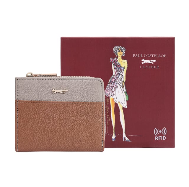 Discover the Tilly Card and Coin Purse, a perfect blend of style and functionality. This sleek accessory is designed to keep your cards and coins organized with ease. Featuring an exterior display section, you can quickly access your most-used bank or travel cards while on the go. Adorned with an iconic fox logo, this purse adds a sophisticated touch to your daily essentials, making it not just practical but also a fashionable statement. Upgrade your accessory game with the Tilly Purse today!