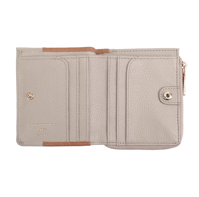 Discover the Tilly Card and Coin Purse, a perfect blend of style and functionality. This sleek accessory is designed to keep your cards and coins organized with ease. Featuring an exterior display section, you can quickly access your most-used bank or travel cards while on the go. Adorned with an iconic fox logo, this purse adds a sophisticated touch to your daily essentials, making it not just practical but also a fashionable statement. Upgrade your accessory game with the Tilly Purse today!