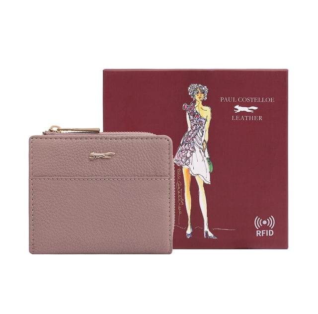 Discover the Tilly Card and Coin Pouch, where sleek design meets practicality. This stylish accessory is expertly crafted for effortless organization, featuring an exterior display section for quick access to your essential bank or travel cards while on the go. The iconic fox logo on the front enhances its sophistication, making it a perfect companion for any occasion. Whether you're heading to work or embarking on a weekend getaway, the Tilly Pouch ensures you stay organized in style.