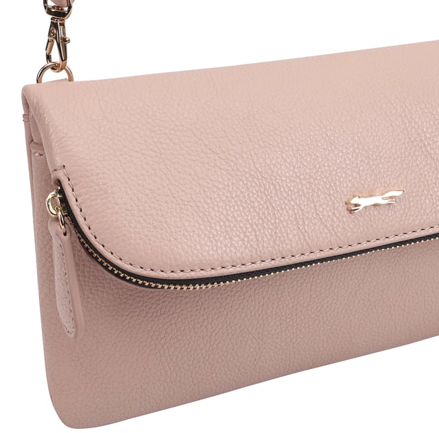The Paul Costelloe CHARON cross-body bag is basically a two-in-one deal as it can also be converted into a clutch. Its leather body is suspended from a detachable shoulder strap which can be whipped off in an instant, and the edge of the foldover magnetic flap is fitted with a zipper for even more storage space on top of the roomy interior.