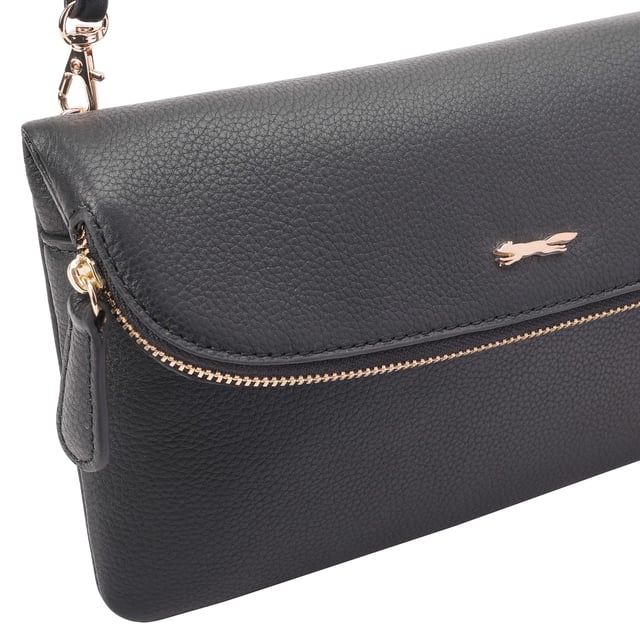 Discover the Paul Costelloe Charon cross-body bag, designed for style and functionality. This chic bag effortlessly transforms into a clutch, making it perfect for any occasion. Crafted from high-quality leather, it features a detachable shoulder strap for versatility. The foldover magnetic flap not only adds a touch of elegance but also includes a zipper for extra storage, ensuring you have ample space for your essentials. Elevate your accessory game with the Charon bag, a must-have for fashion-forward individuals.