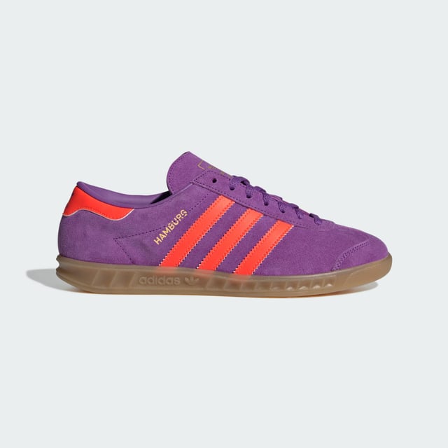Hamburg Shoes A classic reborn. Originally released in 1982, the adidas Hamburg Shoes were visionary trainers in their day. Nowadays, they're ready to forge new paths and set trends on the streetwear scene. Crafted from premium leather with a double-stitched T-toe and contrast heel tab and 3-Stripes, they reinvent retro cool for the modern day. The low-profile rubber outsole with moulded sidewalls and honeycomb traction keeps you stable and your stride steady over the sidewalks and streets of your city. The Hamburg's blend of sporty style and everyday versatility has made them an adidas Originals favourite for over 40 years. Match them with jeans, wide-leg capris or a cute skirt to ground your fashion in authentic adidas heritage. - Regular fit - Lace closure - Leather upper - Synthetic lining - Rubber outsole Shipped by adidas