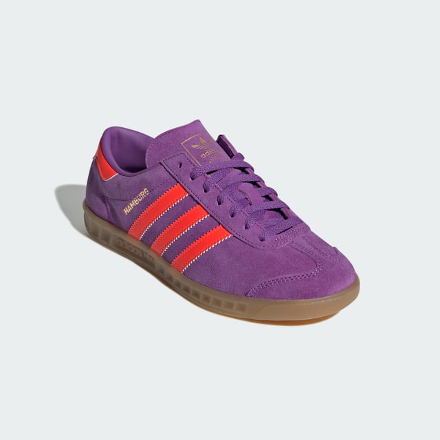 Hamburg Shoes A classic reborn. Originally released in 1982, the adidas Hamburg Shoes were visionary trainers in their day. Nowadays, they're ready to forge new paths and set trends on the streetwear scene. Crafted from premium leather with a double-stitched T-toe and contrast heel tab and 3-Stripes, they reinvent retro cool for the modern day. The low-profile rubber outsole with moulded sidewalls and honeycomb traction keeps you stable and your stride steady over the sidewalks and streets of your city. The Hamburg's blend of sporty style and everyday versatility has made them an adidas Originals favourite for over 40 years. Match them with jeans, wide-leg capris or a cute skirt to ground your fashion in authentic adidas heritage. - Regular fit - Lace closure - Leather upper - Synthetic lining - Rubber outsole Shipped by adidas