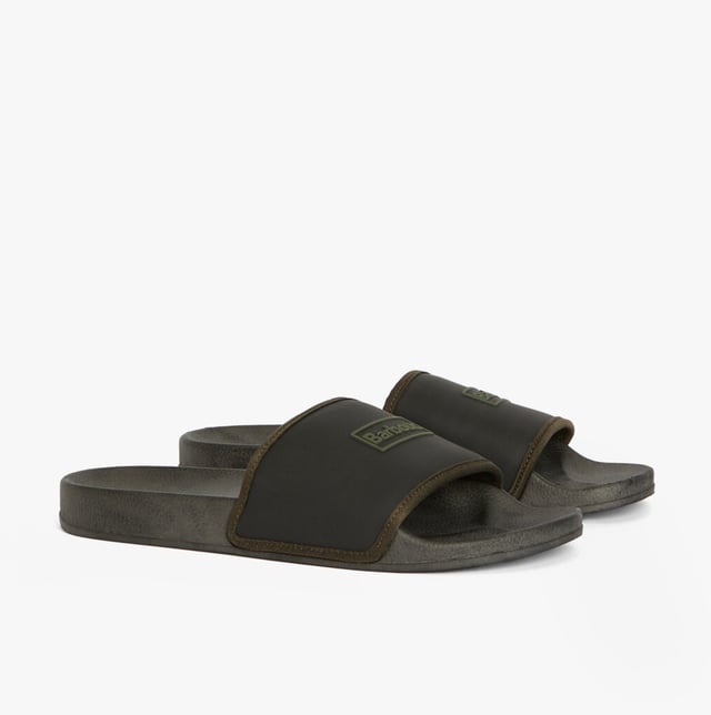 These men's sliders feature a polyurethane upper, neoprene lining, and rubber sole for lightweight comfort. Ideal for casual wear, they are slip-on and easy to clean