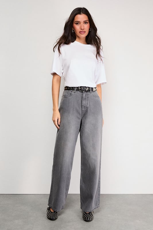 Relaxed boyfriend fit with a contemporary low-rise waist
        Washed denim finish for a lived-in, authentic look
        Classic five-pocket design with traditional stitching detail
        Straight leg silhouette with a full-length cut
        Button-through fastening with branded hardware
    
    These washed denim boyfriend jeans from Warehouse offer the perfect balance of comfort and style for your casual wardrobe. The relaxed fit and low-rise waist create an effortlessly cool silhouette that works brilliantly with a simple white tee and ankle boots, as styled on our model. The straight leg design makes these jeans incredibly versatile - roll the hems for a more casual daytime look or wear full-length for evening drinks. The washed finish gives these jeans a wonderfully soft feel and authentic character that will only improve with wear. Perfect for family gatherings, weekend brunches or casual Friday at the office - simply switch your footwear from trainers to heeled boots to transition your look from day to night.
