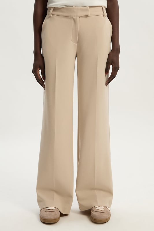 A capsule wardrobe piece that can be styled multiple ways, these trousers are cut in a modern straight leg design that hangs to the ankles with classic belt loops for practicality. Pair this piece with a matching blazer for a sleek workwear ensemble that can go from desk to dinner.Straight legBelt loopsTailored Browse this seasons suits now.