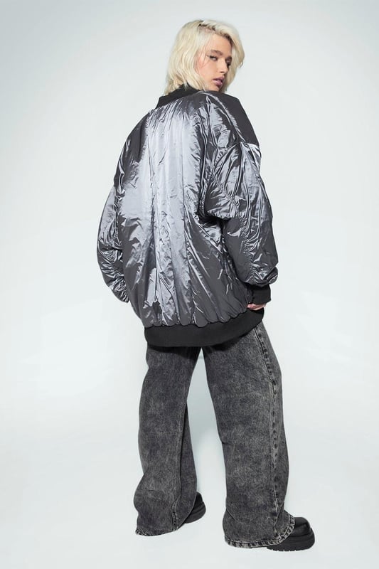 Keep things casual but always on-trend with a piece of outerwear perfection, the bomber jacket. A light jacket featuring a gathered, ribbed waistband and matching cuffs, a bomber jacket is versatile, timeless, and the perfect way to edge up your casual wear. Wear your new women's bomber jacket with a shirt and stripe joggers for the hottest look of the moment: sports luxe, or layer a varsity jacket over a t shirt dress for a fresh new-season look.Style: Bomber JacketLength: RegularSleeve Length: Long Sleeve