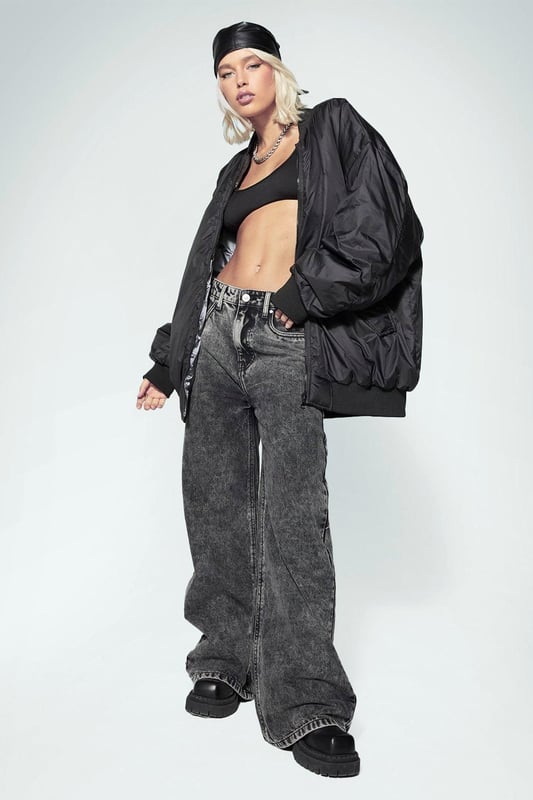 Keep things casual but always on-trend with a piece of outerwear perfection, the bomber jacket. A light jacket featuring a gathered, ribbed waistband and matching cuffs, a bomber jacket is versatile, timeless, and the perfect way to edge up your casual wear. Wear your new women's bomber jacket with a shirt and stripe joggers for the hottest look of the moment: sports luxe, or layer a varsity jacket over a t shirt dress for a fresh new-season look.Style: Bomber JacketLength: RegularSleeve Length: Long Sleeve