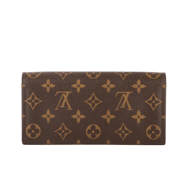 Louis Vuitton Accesorios Emilie  Cartera en Marrón/Naranja Lona recubierta y Latón dorado hardware. El producto esta en Perfectas Condiciones (AA).
  19x9.5x1.5 cm 
  Accesorios incluidos: None
  
  BrandCo Paris encuentra artículos raros y en las mejores condiciones a precios increíbles. ¡Vale la pena tener paciencia! Compra con confianza: todos los artículos de BrandCo Paris son seleccionados y autenticados cuidadosamente por nuestro equipo de expertos.
  Todos los artículos vienen con un certificado de autenticidad y un embalaje entregado por BrandCo Paris.
  Tabla de clasificación de la condición del artículo
  N (como nuevo)
  AA (perfecto estado)
  A (excelente estado)
  AB (muy buen estado)
  B (bueno/regular)