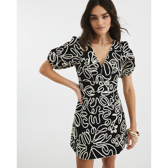 V-neck, Short puff sleeves, Floral applique detail, Button detail, Zip fastening, Mini lengthAbout the brandFASHION IS OUR DNARiver Island is an icon of the British high street. Inspired by the latest trends and our heritage style archives, we've been serving style and leading trends for over sixty years.We make fashion for real people with real lives, who want to look real good. Because life's a celebration - let's dress for it.