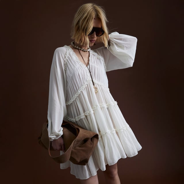 V-neck, Long sleeves, Ruffle detail, Mini lengthAbout the brandFASHION IS OUR DNARiver Island is an icon of the British high street. Inspired by the latest trends and our heritage style archives, we've been serving style and leading trends for over sixty years.We make fashion for real people with real lives, who want to look real good. Because life's a celebration - let's dress for it.