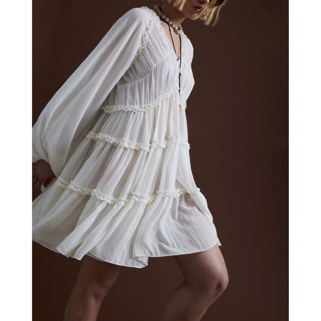 V-neck, Long sleeves, Ruffle detail, Mini lengthAbout the brandFASHION IS OUR DNARiver Island is an icon of the British high street. Inspired by the latest trends and our heritage style archives, we've been serving style and leading trends for over sixty years.We make fashion for real people with real lives, who want to look real good. Because life's a celebration - let's dress for it.