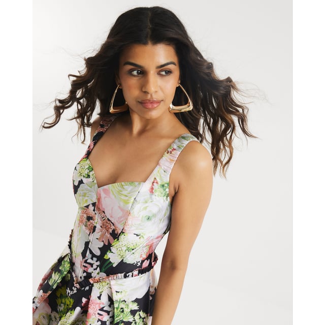 Petite collection, Satin fabric, Floral print, Bubble hem, Square neckline, Sleeveless, Mini lengthAbout the brandFASHION IS OUR DNARiver Island is an icon of the British high street. Inspired by the latest trends and our heritage style archives, we've been serving style and leading trends for over sixty years.We make fashion for real people with real lives, who want to look real good. Because life's a celebration - let's dress for it.