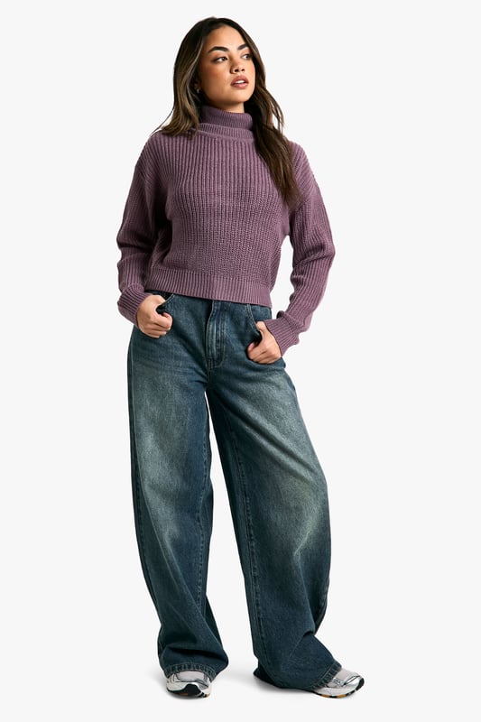 Cropped length for a trendy silhouette
        Ribbed knit texture for added visual interest
        Relaxed fit through the body for comfort
        Roll neck design for warmth and style
        Versatile piece for layering or wearing alone
    
    This short roll neck jumper from Boohoo is the perfect addition to your casual wardrobe. The cropped length and relaxed fit create a contemporary silhouette that's both comfortable and stylish. Pair it with high-waisted wide-leg jeans and trainers for a laid-back weekend look, or dress it up with a midi skirt and ankle boots for a casual night out. The ribbed texture adds a touch of visual interest, while the roll neck keeps you cosy on chilly days. Layer it under a oversized blazer for a smart-casual ensemble, or wear it on its own with your favourite denim for effortless style. This versatile piece is ideal for family gatherings, coffee dates with friends, or casual Fridays at the office. Its simplicity makes it easy to customise with accessories, allowing you to create multiple looks with just one garment.
