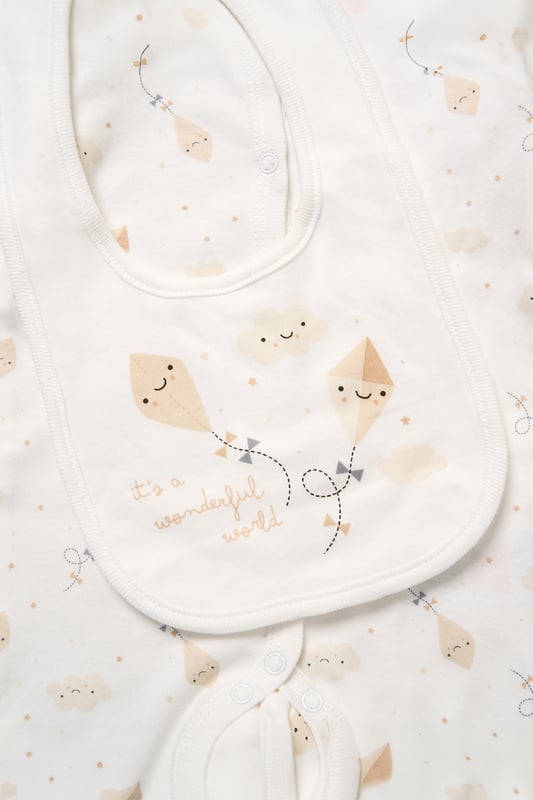 Surprise new parents with the printed 5-Piece baby gift Set from Rock A Bye Baby Boutique. This thoughtful bundle includes a cosy matching all-in-one, bodysuit, bib, hat, and mitts for essential wardrobe pieces. Crafted from 100% cotton, each item ensures their baby stays stylish and snug, perfect for everyday wear or special occasions. Packaged elegantly in a mesh bag.