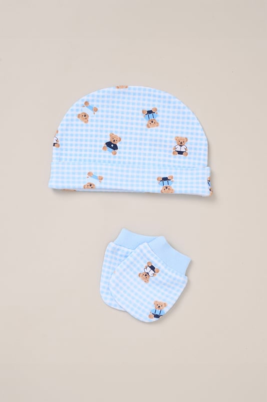 Surprise new parents with the printed 5-Piece baby gift Set from Rock A Bye Baby Boutique. This thoughtful bundle includes a cosy matching all-in-one, bodysuit, bib, hat, and mitts for essential wardrobe pieces. Crafted from 100% cotton, each item ensures their baby stays stylish and snug, perfect for everyday wear or special occasions. Packaged elegantly in a mesh bag.
