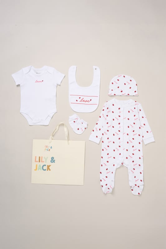 Surprise new parents with this adorable love heart printed five-Piece Hanging Gift Set from Lily and Jack. This thoughtful bundle features an all-over illustrated print, including a cosy all-in-one, coordinating bodysuit, bib, hat, and mitts. Crafted with care for style and comfort, each item ensures their baby stays snug and stylish for everyday wear or special occasions. Packaged elegantly in a mesh bag, it's the perfect way to celebrate the newest addition to their family.