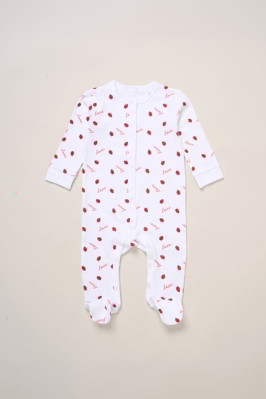 Surprise new parents with this adorable love heart printed five-Piece Hanging Gift Set from Lily and Jack. This thoughtful bundle features an all-over illustrated print, including a cosy all-in-one, coordinating bodysuit, bib, hat, and mitts. Crafted with care for style and comfort, each item ensures their baby stays snug and stylish for everyday wear or special occasions. Packaged elegantly in a mesh bag, it's the perfect way to celebrate the newest addition to their family.