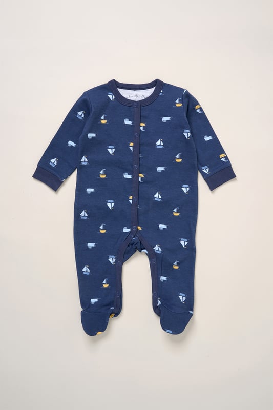 Surprise new parents with the printed 5-Piece baby gift Set from Rock A Bye Baby Boutique. This thoughtful bundle includes a cosy matching all-in-one, bodysuit, bib, hat, and mitts for essential wardrobe pieces. Crafted from 100% cotton, each item ensures their baby stays stylish and snug, perfect for everyday wear or special occasions. Packaged elegantly in a mesh bag.