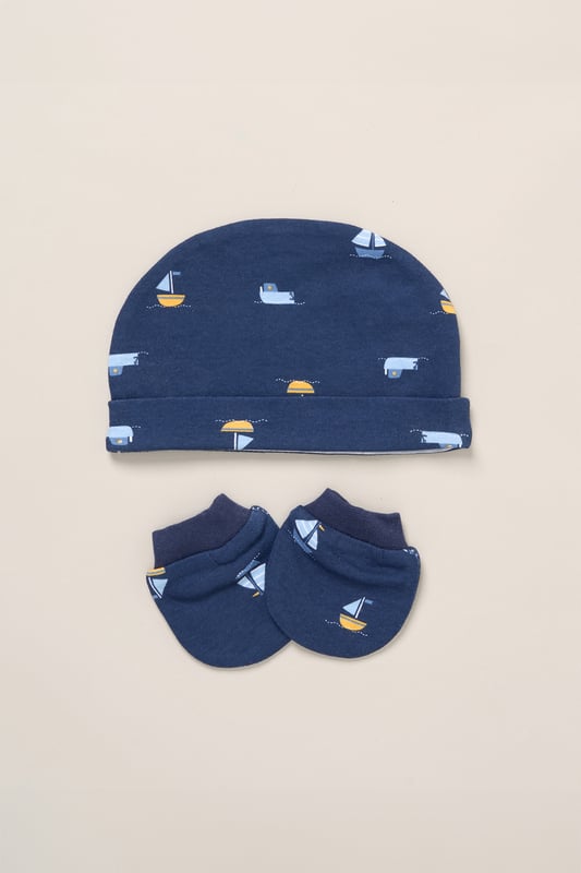 Surprise new parents with the printed 5-Piece baby gift Set from Rock A Bye Baby Boutique. This thoughtful bundle includes a cosy matching all-in-one, bodysuit, bib, hat, and mitts for essential wardrobe pieces. Crafted from 100% cotton, each item ensures their baby stays stylish and snug, perfect for everyday wear or special occasions. Packaged elegantly in a mesh bag.