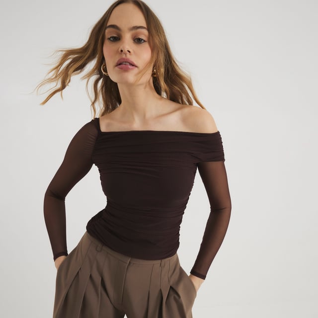 River Island Womens Brown Asymmetric Neck Ruched Mesh Top Asymmetric neckline, Ruched detail, Mesh detail, Long sleevedAbout the brandFASHION IS OUR DNARiver Island is an icon of the British high street. Inspired by the latest trends and our heritage style archives, we've been serving style and leading trends for over sixty years.We make fashion for real people with real lives, who want to look real good. Because life's a celebration - let's dress for it.