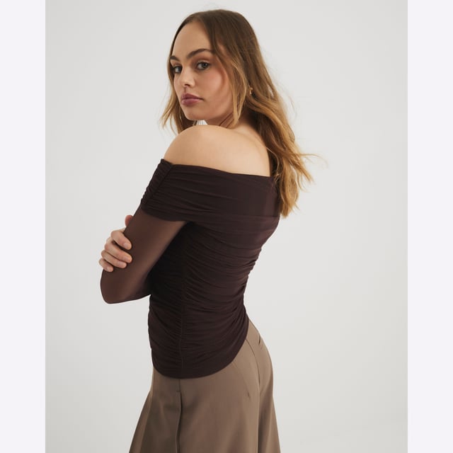 River Island Womens Brown Asymmetric Neck Ruched Mesh Top Asymmetric neckline, Ruched detail, Mesh detail, Long sleevedAbout the brandFASHION IS OUR DNARiver Island is an icon of the British high street. Inspired by the latest trends and our heritage style archives, we've been serving style and leading trends for over sixty years.We make fashion for real people with real lives, who want to look real good. Because life's a celebration - let's dress for it.