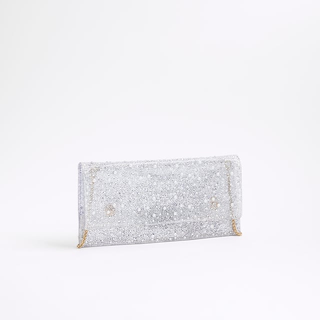 River Island Womens Clear Perspex Embellished Clutch Bag Perspex style, Chain shoulder strap, Popper fastening, Strap size: 22cm, Dimensions H: 14cm x W: 27.3cmAbout the brandFASHION IS OUR DNARiver Island is an icon of the British high street. Inspired by the latest trends and our heritage style archives, we've been serving style and leading trends for over sixty years.We make fashion for real people with real lives, who want to look real good. Because life's a celebration - let's dress for it.