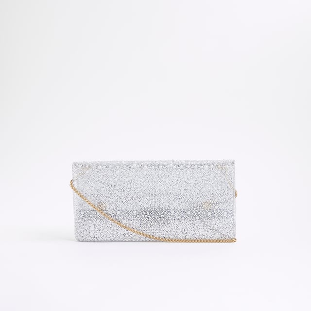 River Island Womens Clear Perspex Embellished Clutch Bag Perspex style, Chain shoulder strap, Popper fastening, Strap size: 22cm, Dimensions H: 14cm x W: 27.3cmAbout the brandFASHION IS OUR DNARiver Island is an icon of the British high street. Inspired by the latest trends and our heritage style archives, we've been serving style and leading trends for over sixty years.We make fashion for real people with real lives, who want to look real good. Because life's a celebration - let's dress for it.